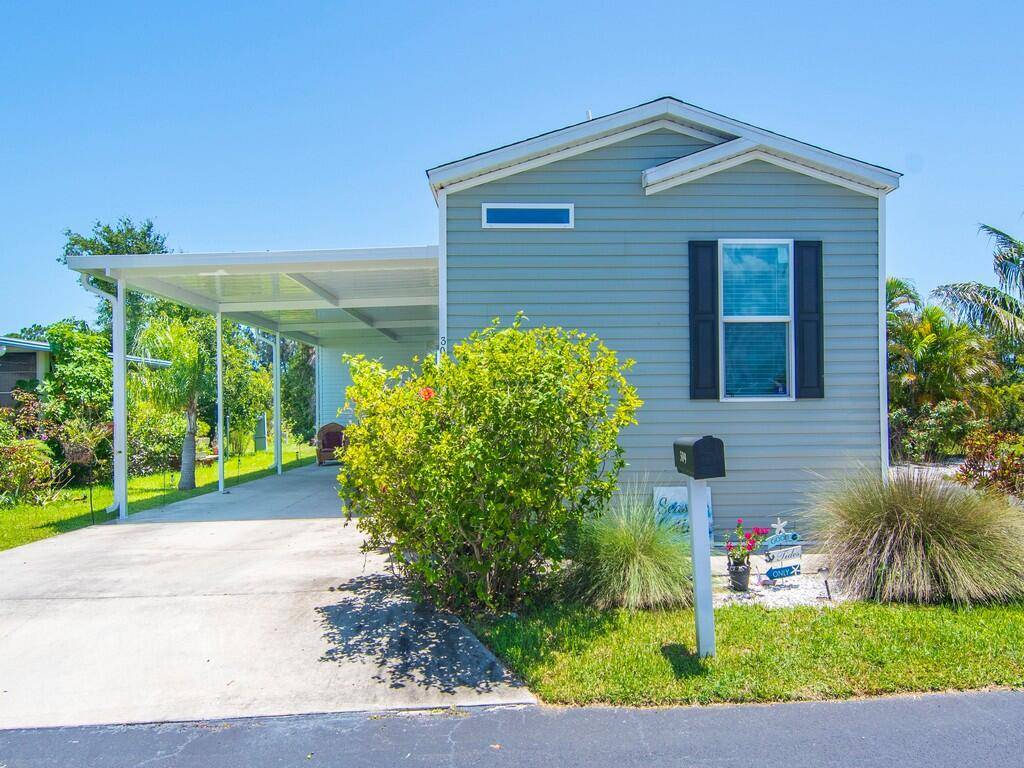 Welcome to this gorgeous manufactured home in the welcoming 55 community of Sandhill Shores !