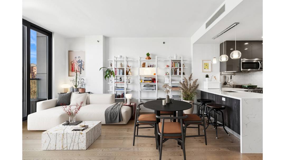 PERFECT 1 BED LAYOUT WITH PARTIAL CITY VIEWS, A BALCONY, AND PARKING ACROSS FROM THE PARK !