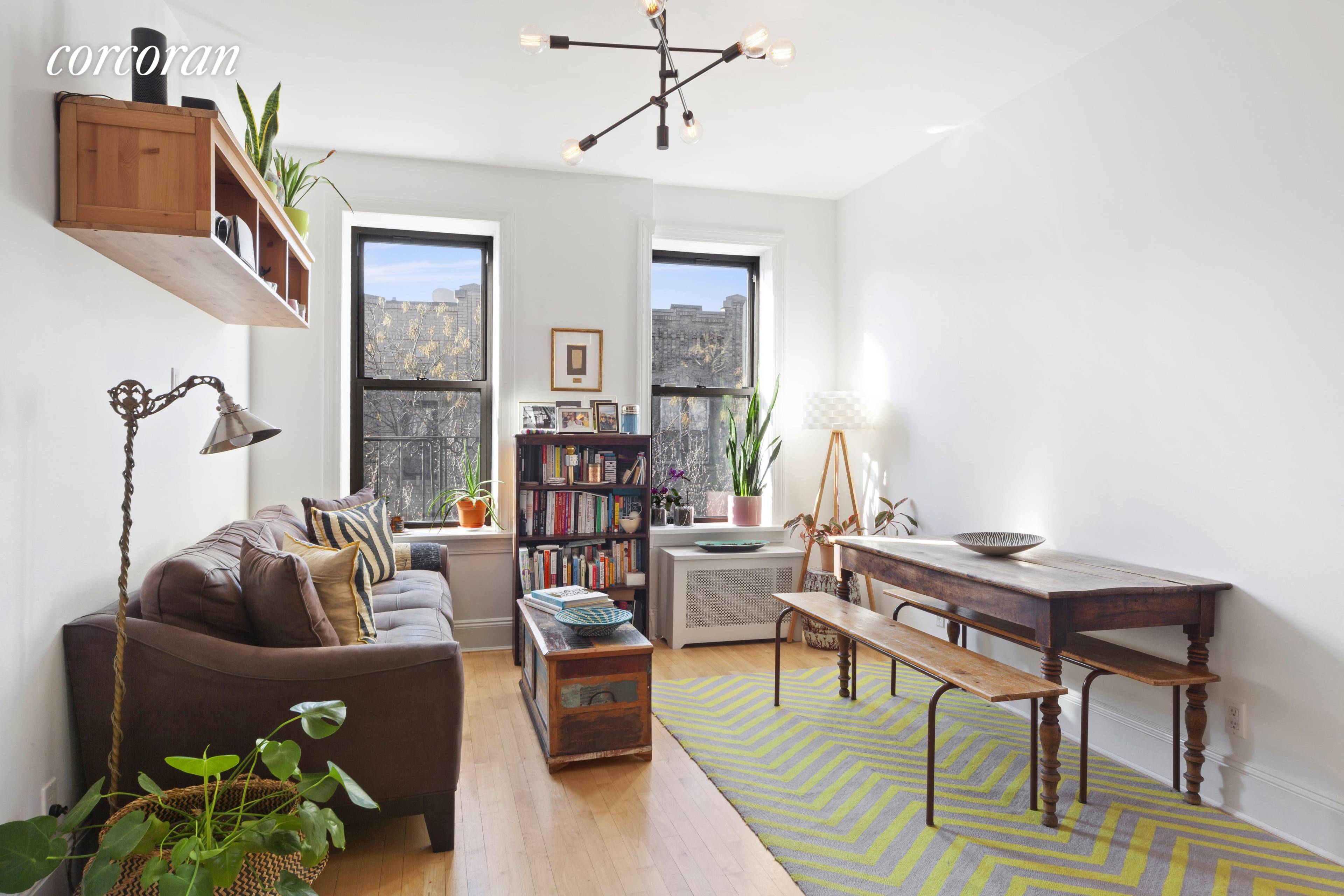 Welcome to 251 Pacific Street, 22, a smartly designed south facing 2 bedroom Coop featuring tree lined views that bathe in light.