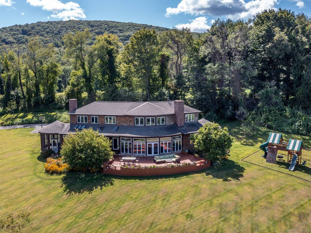 Private Estate with Panoramic Views in Coveted Kent Hollow.