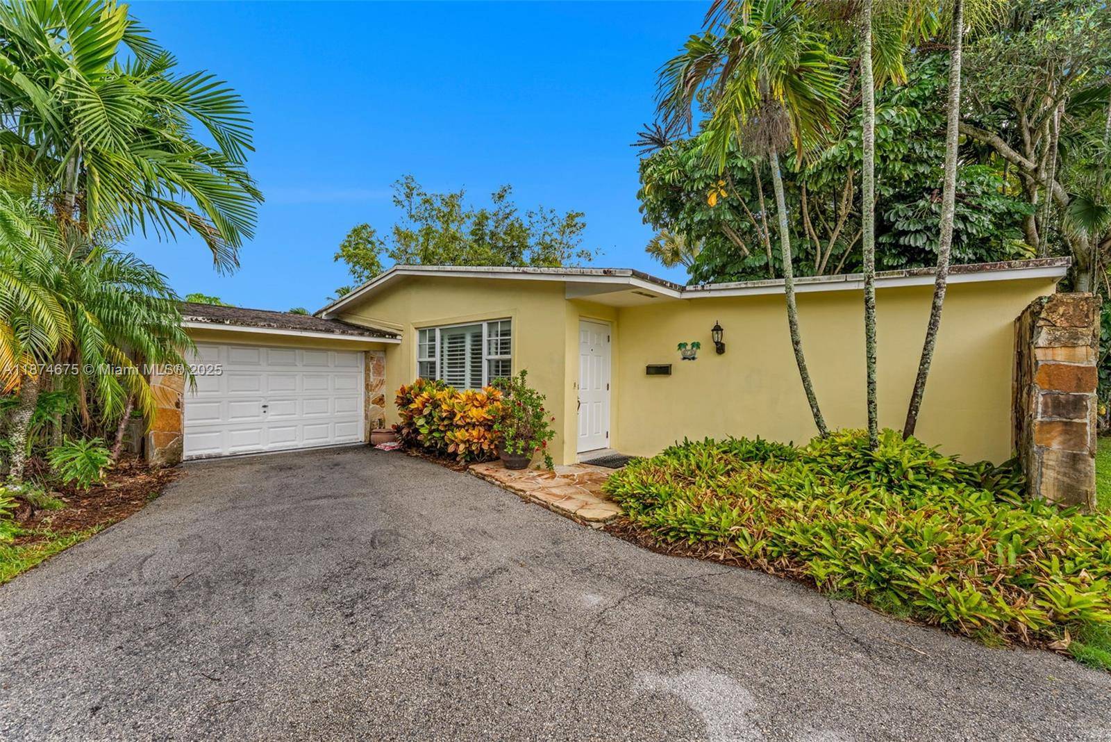 Enjoy the highly desirable Palmetto Country Club Estates lifestyle in this home with a sparkling pool and expansive backyard.