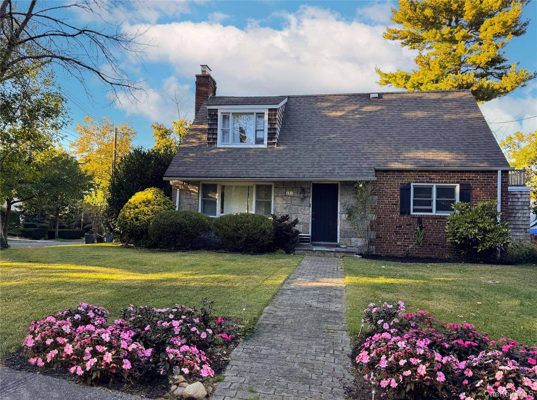 Expanded Cape Cod located in one of the most sought after waterfront communities in Queens, this charming residence offers a perfect blend of comfort and style.