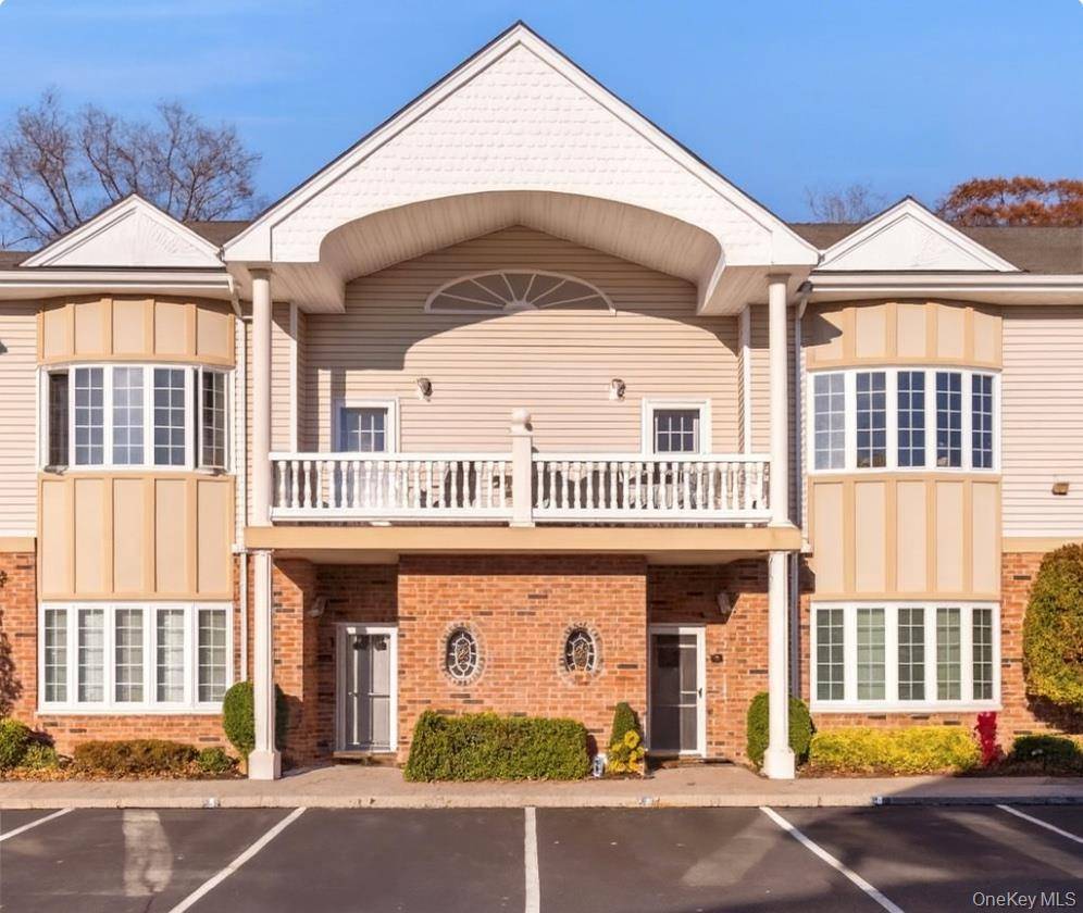 Welcome to carefree living in this beautiful top floor condo in Amityville's desirable gated community of Village Estates.