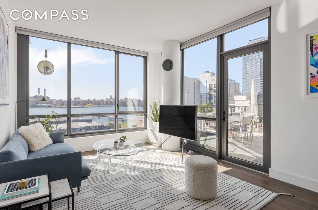 This luxurious two bedroom, two bathroom penthouse offers an expansive terrace with sweeping views of the East River and the Manhattan skyline.