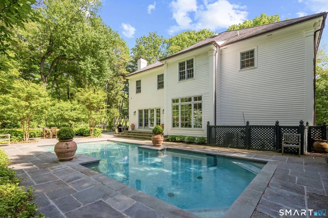 Located in the coveted Greenfield Hill neighborhood, this exceptional property offers the perfect blend of weekend retreat and everyday living, just 60 miles from Manhattan.