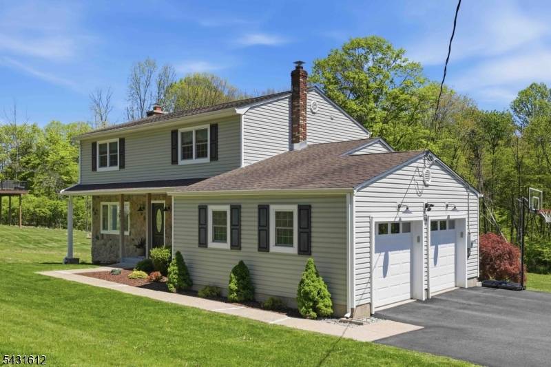 Beautifully maintained 4 bedroom Colonial with a Stunning Finished Walkout Basement adding extra finished sqft, perfectly situated on.