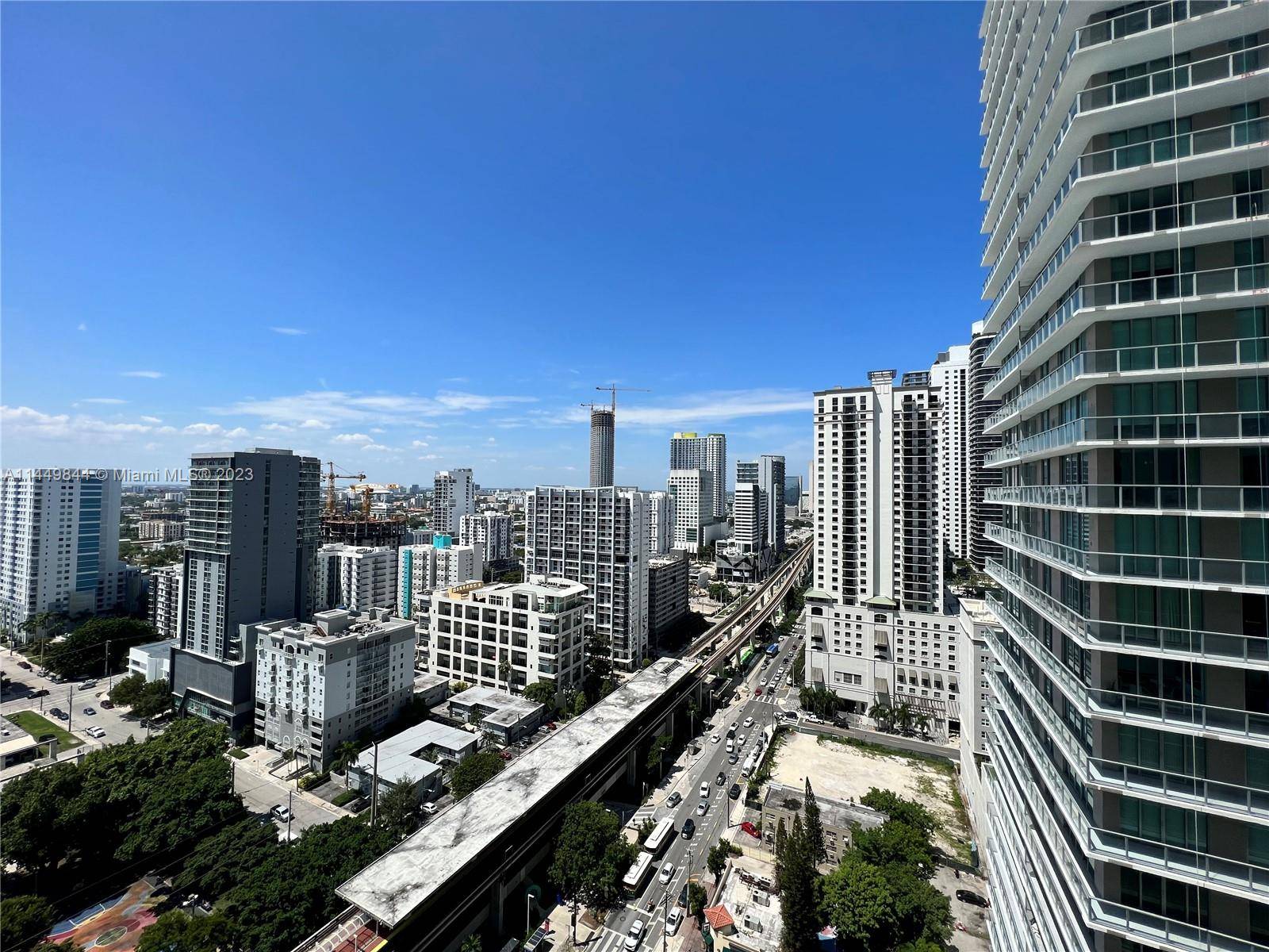 Excellent location two master bedroom unit in The Axis South Tower.