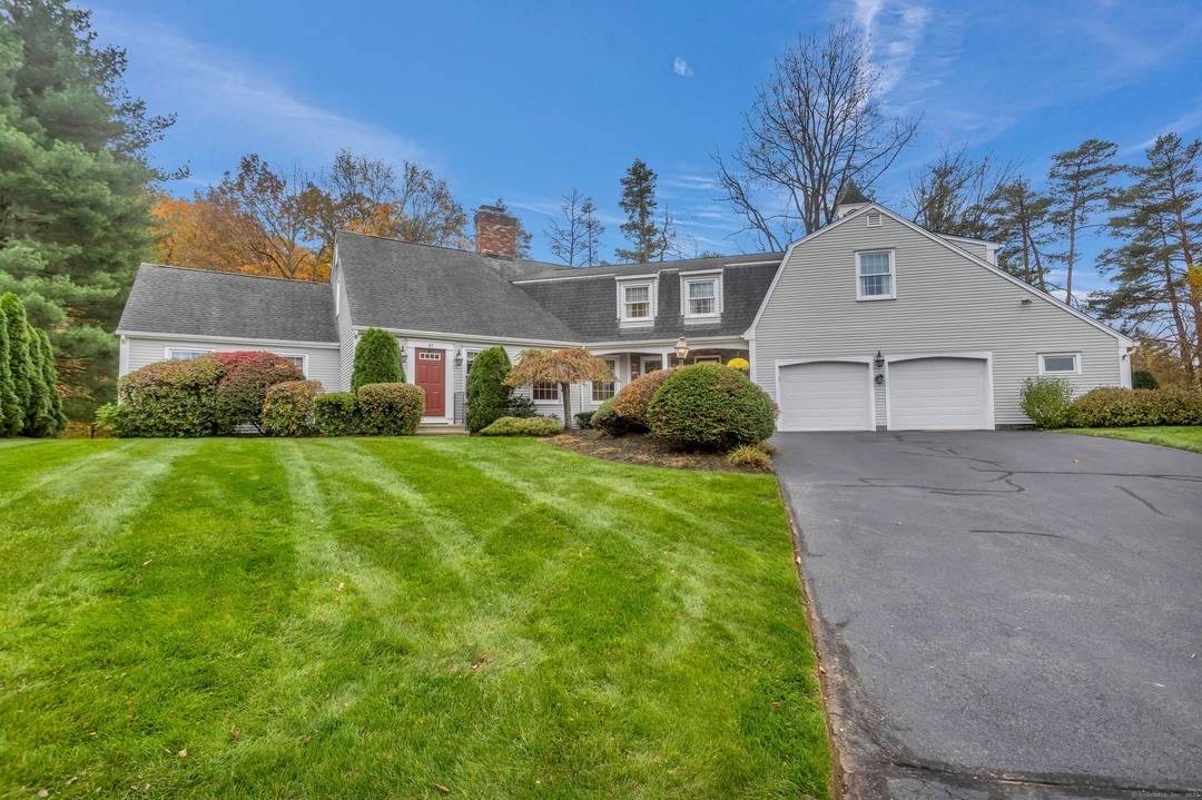 You will fall in love with this custom built home in a premier Suffield location !