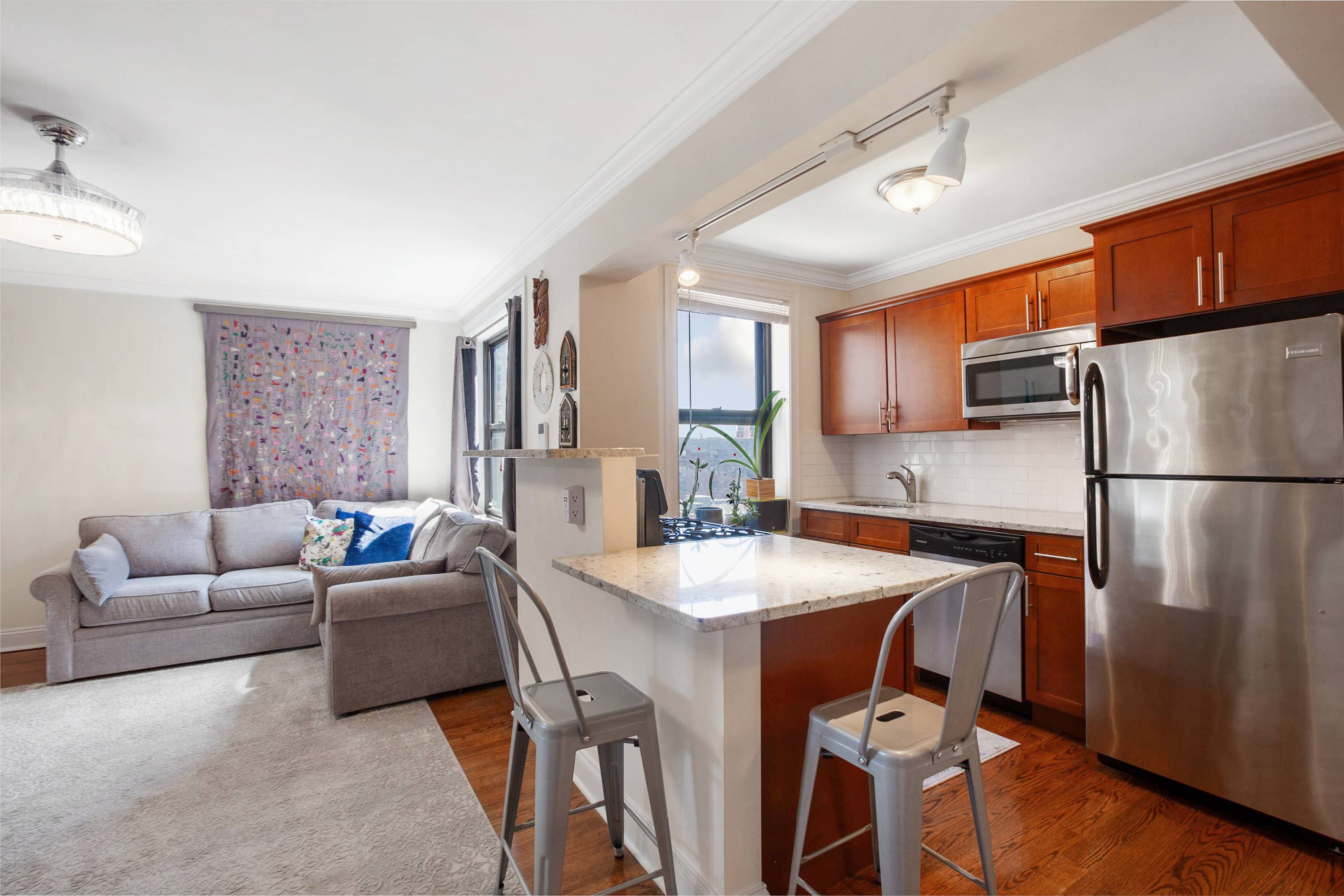 Cheerful Eastern light brightens your open concept, higher floor apartment home.