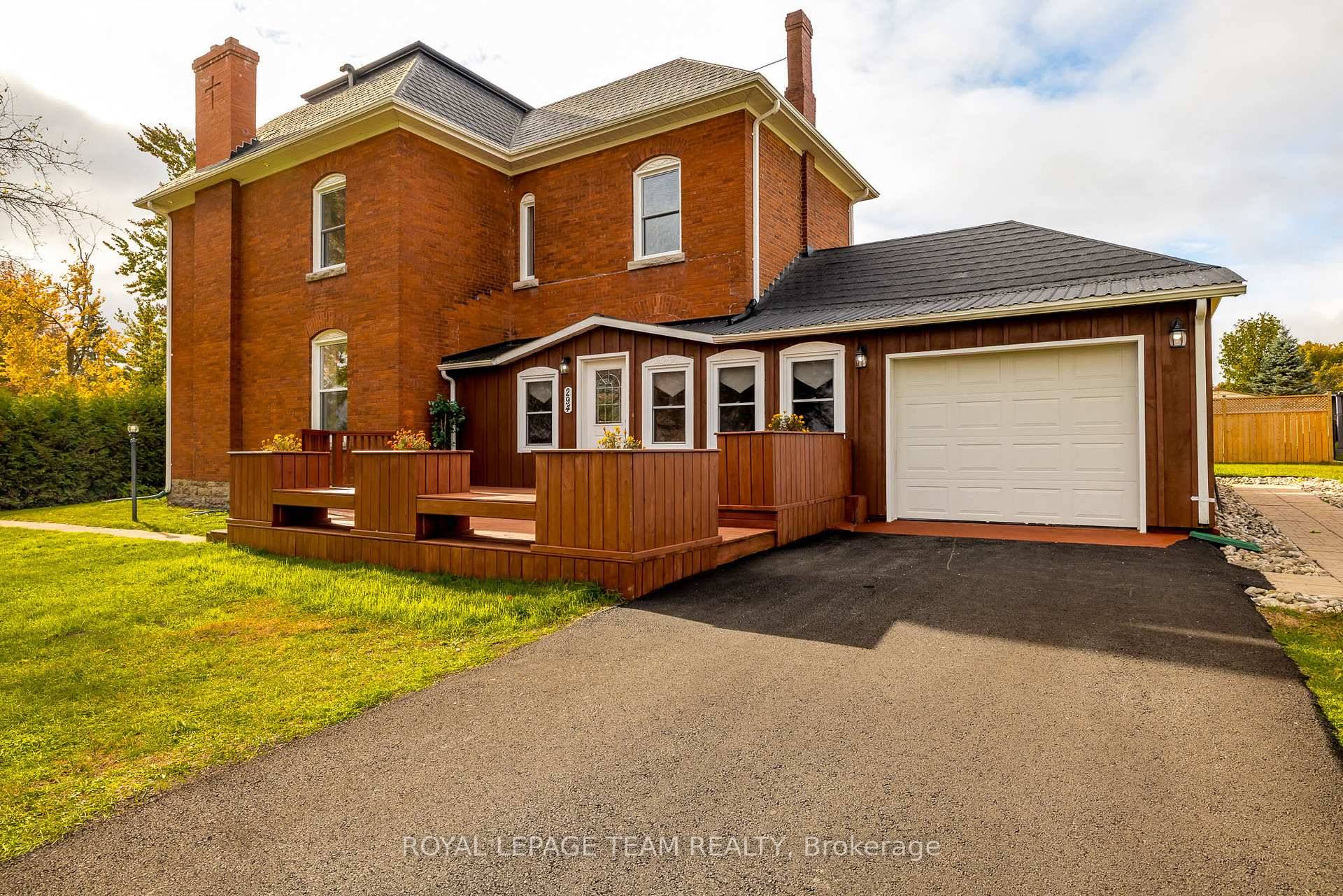 Nestled in the charming heart of Downtown Kemptville, this absolutely gorgeous Triple Brick home presents a rare opportunity for discerning buyers.