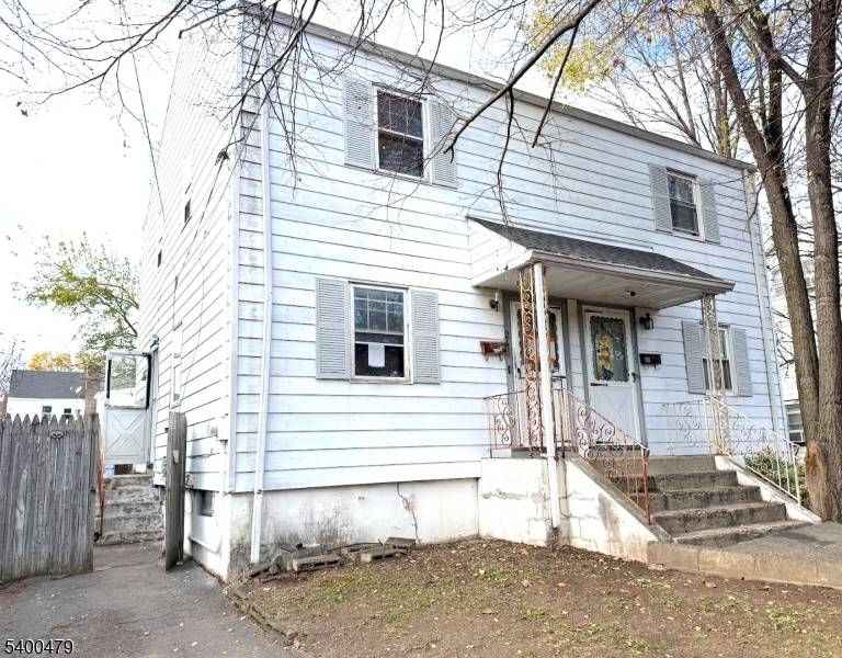 Discover the potential in this 2 bedroom, 1 bath Half Duplex.