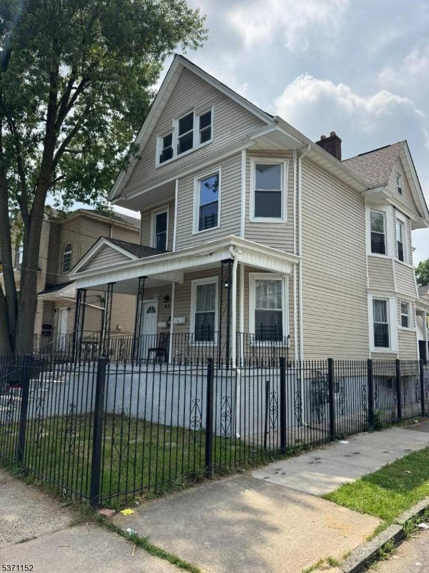 Step into this Clean and Beautifully Updated Corner Property Two Family Home ?