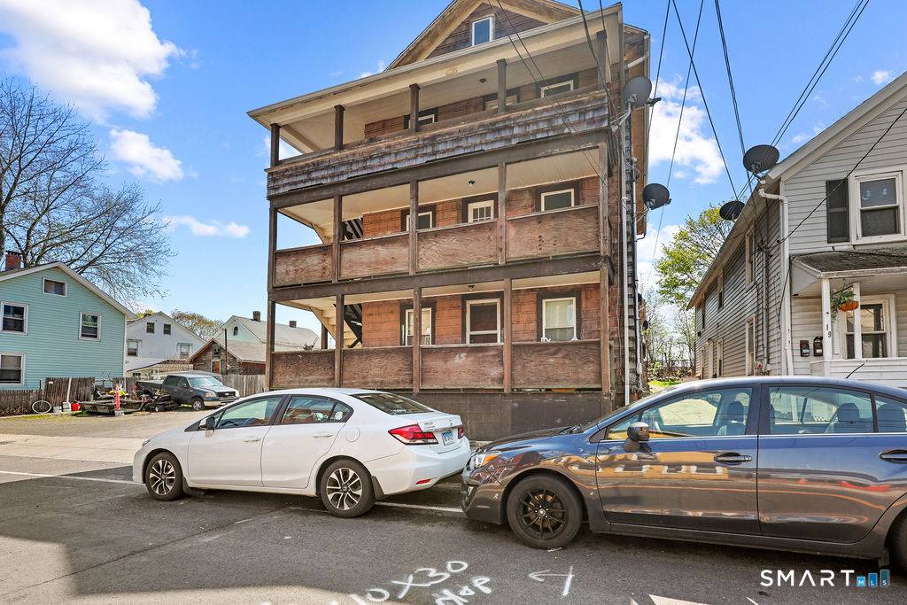 Exceptional mixed use investment opportunity in Middletown, with views of CT River and landmark Arrigoni Bridge.