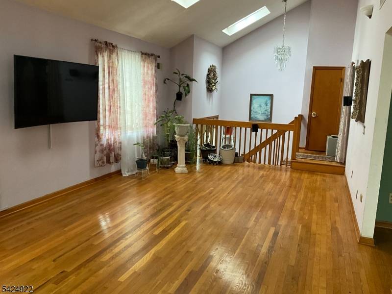 Spacious custom home, has 1st floor in law suite with separate entrance, Convenient location, near public transportation, shopping, schools and houses of worship.