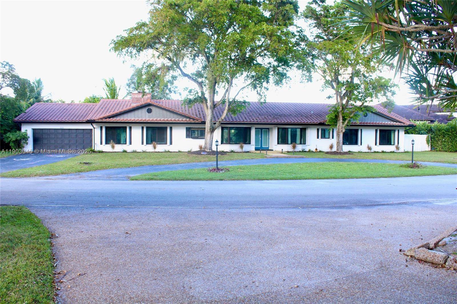 Experience Waterfront Living with this 5 bed, 4 bath Pool Home located in Jacaranda Country Club, one of Plantation s Most Sought After Communities.