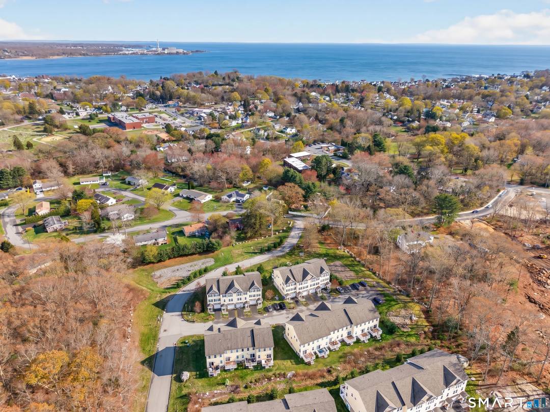 11 Village Crossing offers a spacious and thoughtfully designed layout featuring two full bathrooms, one half bath, and a two car under house garage.