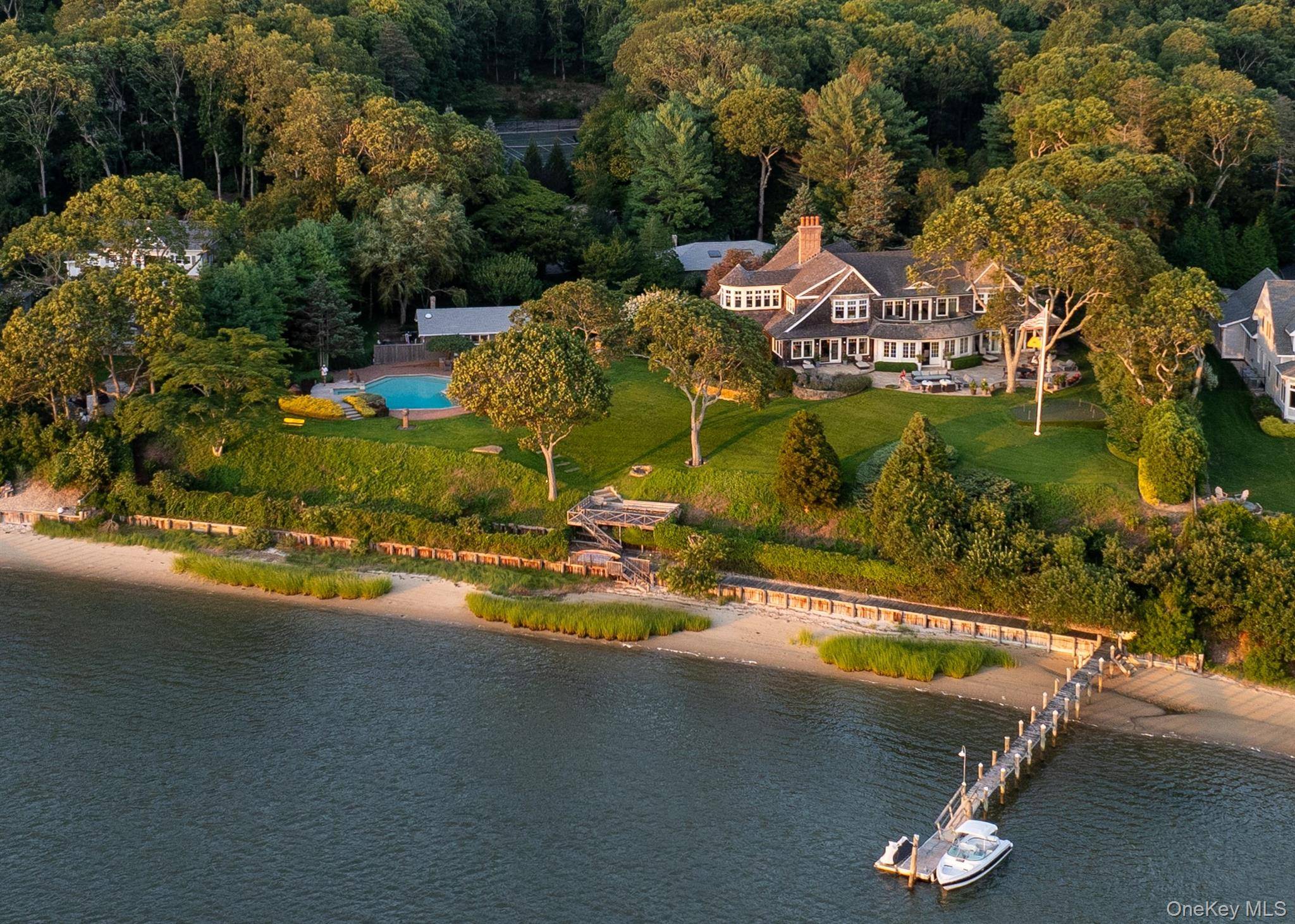 Rarely available in size, scope, and setting, this generational Nassau Point estate is a standout along the Peconic Bay its beauty long admired by passing boaters.