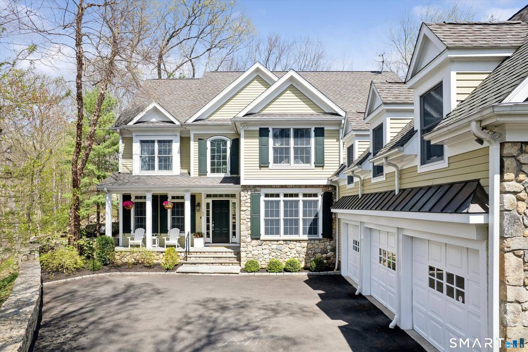A rare opportunity in a sought after neighborhood, this classic Newfield Colonial sits on a private 0.