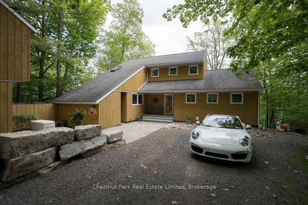 Tucked along the protected shores of Prinyers Cove, this exceptional waterfront home offers a rare blend of mid century modern design, deep clear waterfront, and a welcoming waterfront community.