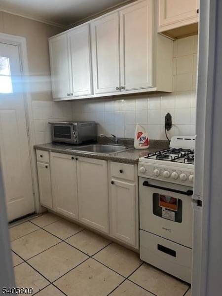 Newark Ironbound, location, location, this home is an alternative to a condo without association fees and regulations, offers 2 bedrooms plus a room that may be used as a 3 ...