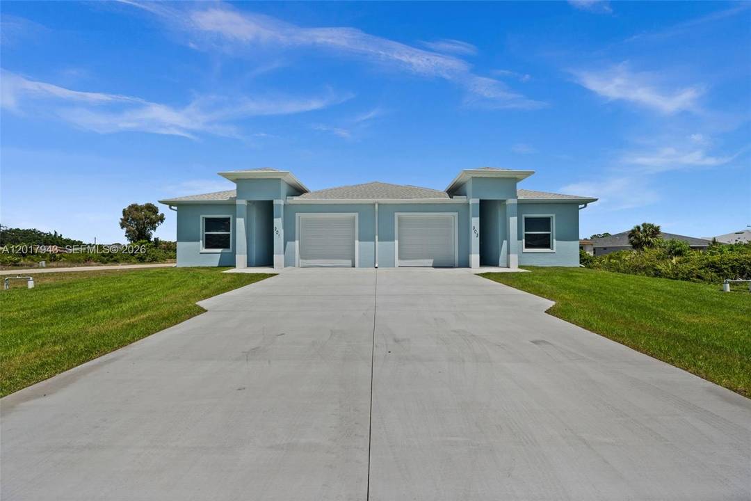Stunning new construction duplex located in the fast growing area of Lehigh Acres !