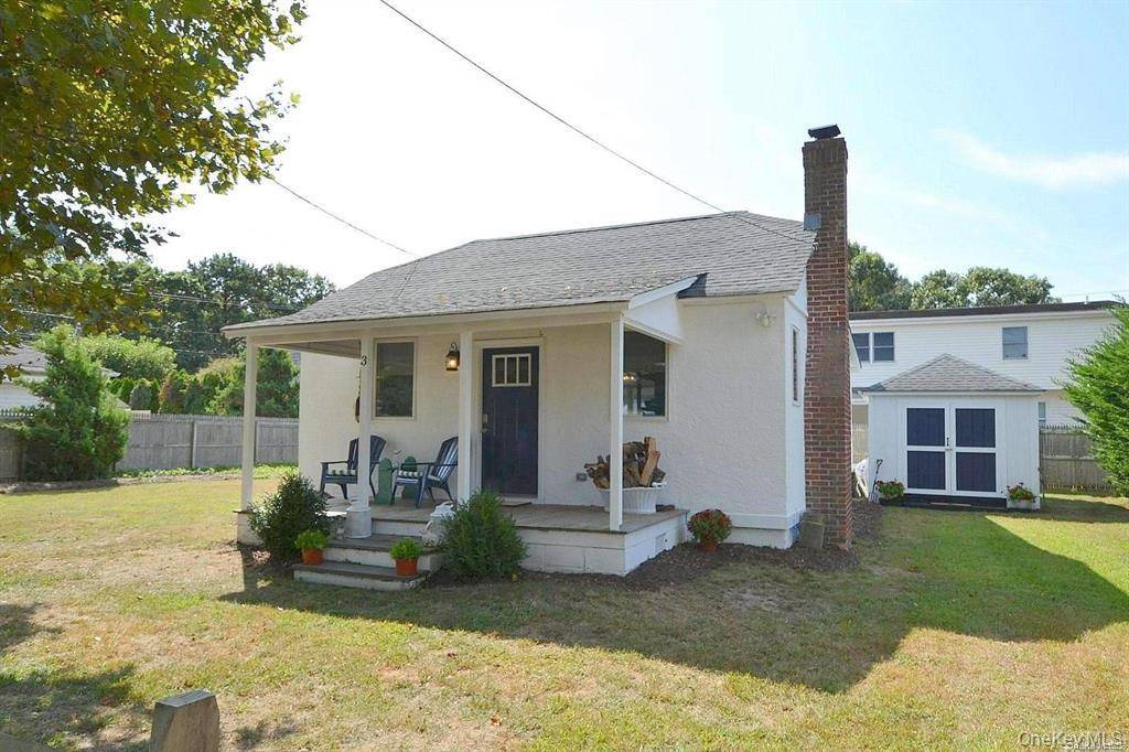 This charming 2 bedroom, 1 bath beach cottage in Rampasture Point, Hampton Bays offers a perfect coastal retreat.