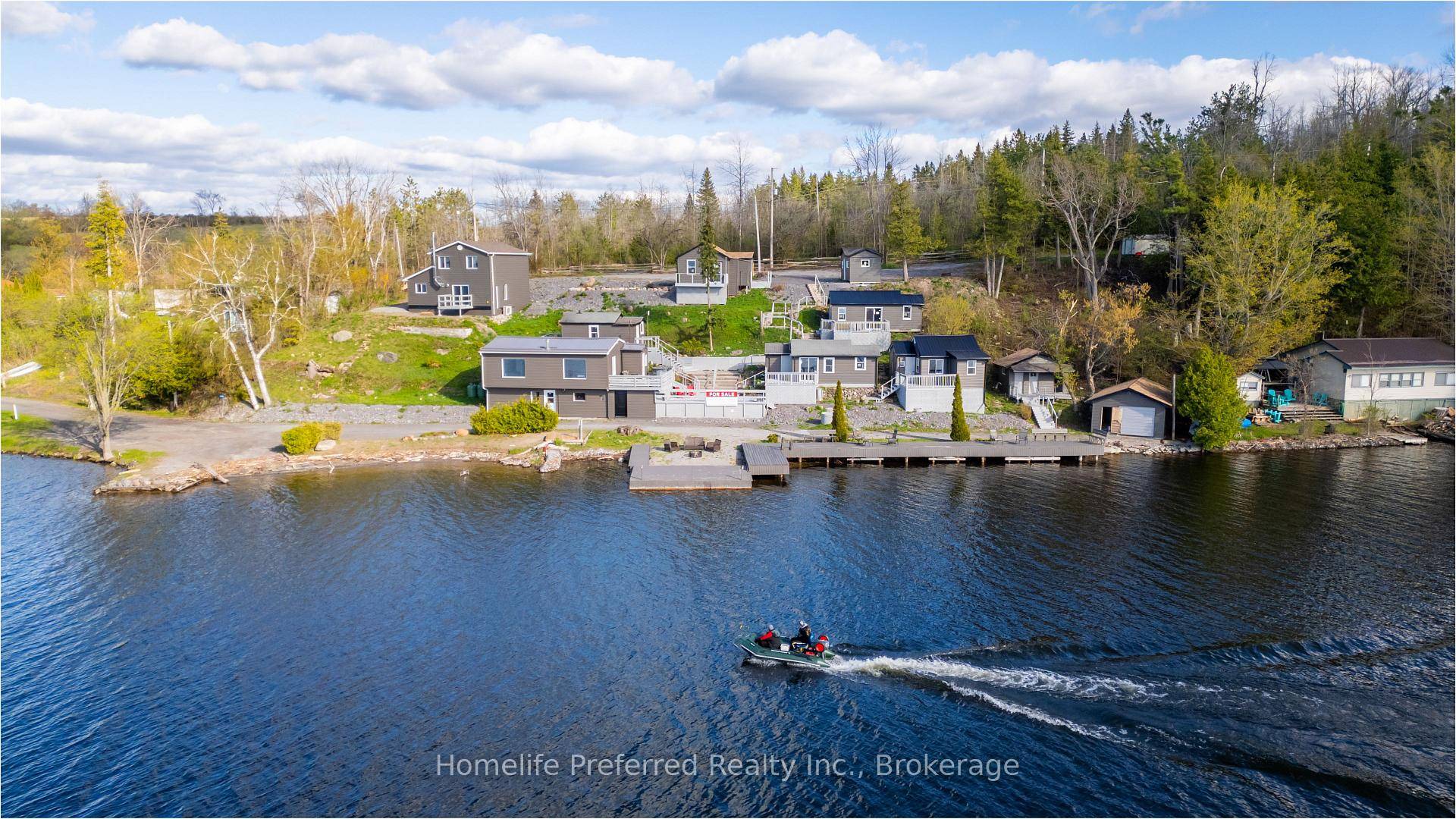 2 luxury homes, both 3 bedrooms 5 rental cottages3 separate buildings that could make into 3 more cottages.