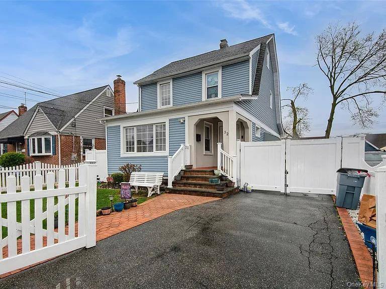 Discover this beautifully renovated 4 bedroom colonial perfectly situated on a quiet, tree lined street in Hempstead.