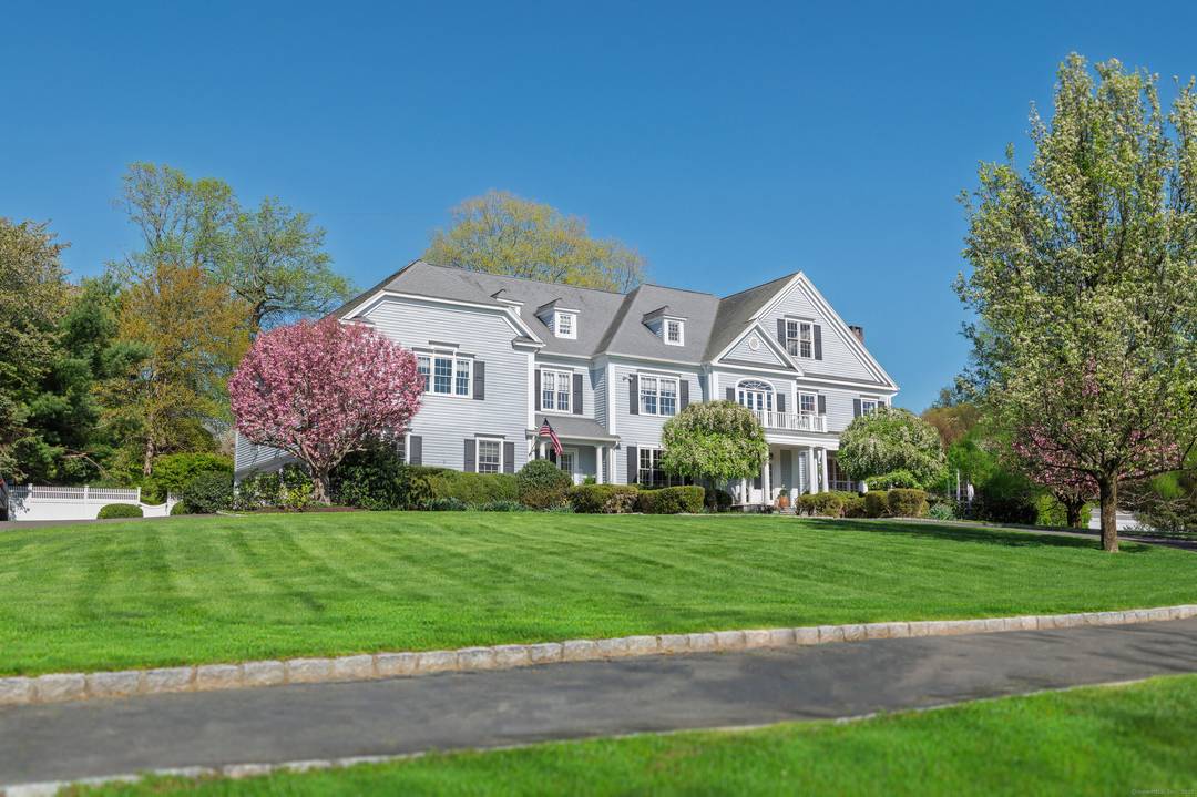 Elegantly situated in one of Fairfield County's most desirable scenic roads, this timeless Estate offers luxury and privacy on 2 acres of spectacular park like grounds.