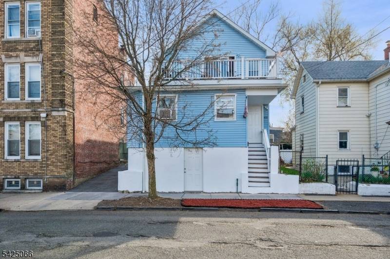 Updated well kept two family residence ideally situated in a quiet, convenient Orange location.