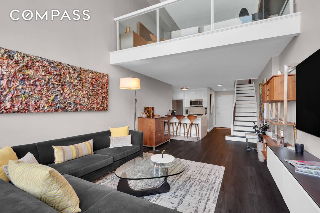 Sleek downtown style meets timeless Upper West Side living in this rare 1 bedroom, 1.