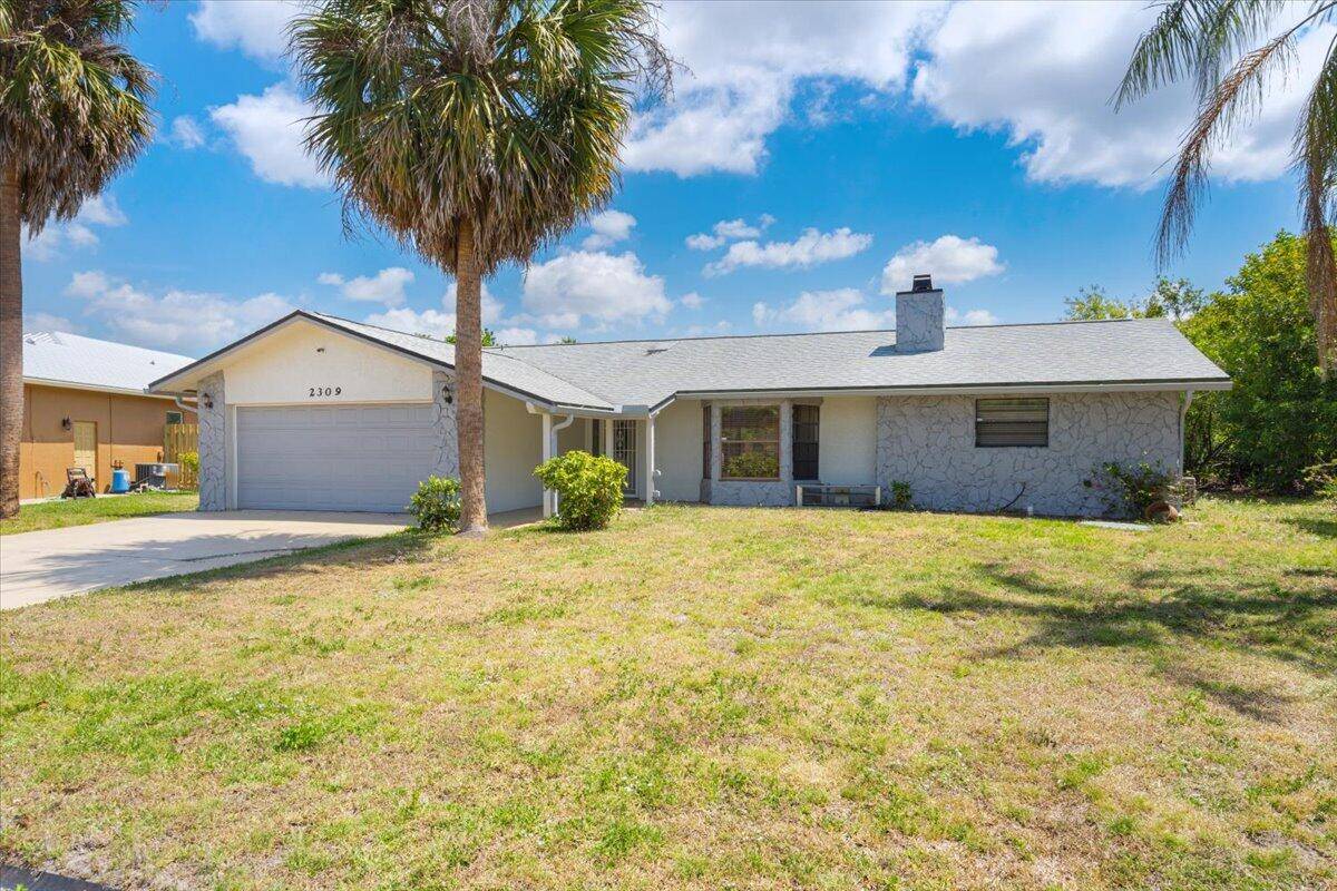 Welcome to this well maintained 3 bedroom, 2 bath pool home with a den featuring a built in Murphy bed perfect for guests or a home office.