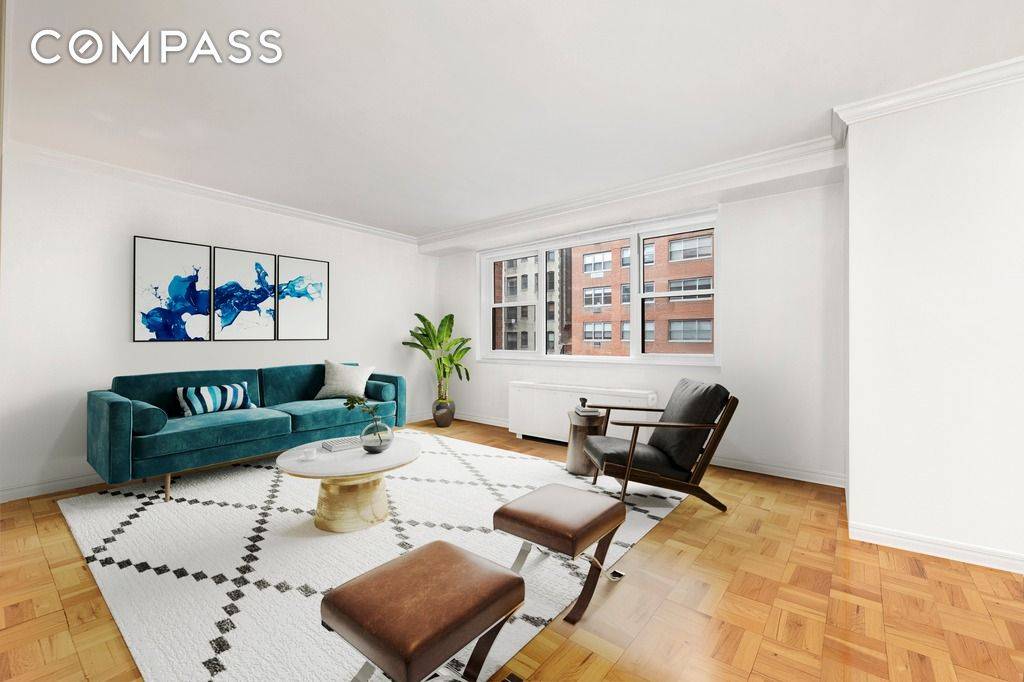 A charming alcove studio on a prime block between Park and Lexington Avenues !