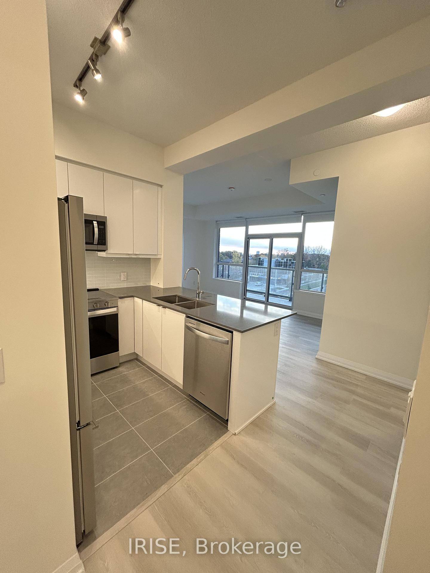 Welcome to this bright and spacious southwest corner 2 bedroom, 2 bathroom suite at Pinnacle Toronto East, where modern design meets everyday comfort.