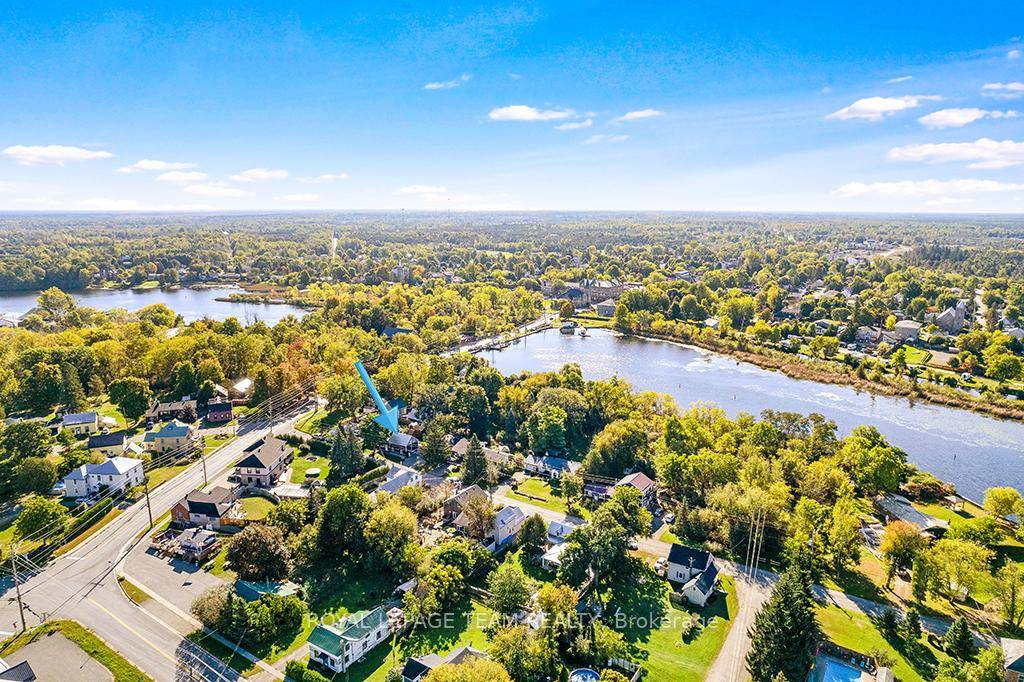 Step into timeless charm and modern comfort with this beautifully restored 1830s log home, located in the historic village of Merrickville.