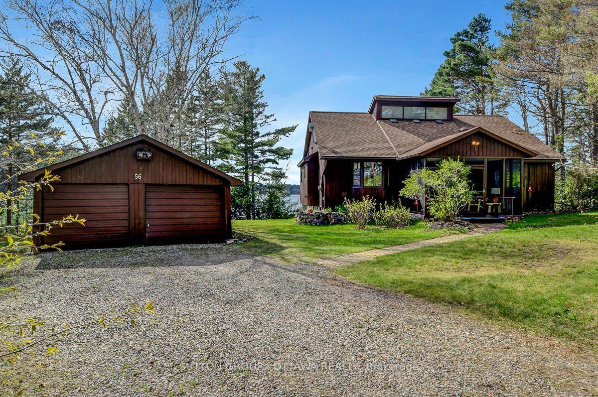 WATERFRONT PROPERTY with beautifully maintained 2 2 bedroom, 4 bathroom home on an oversized, private lot perfectly positioned on the highly sought after Olmstead Jeffrey Lake with 120 feet of ...
