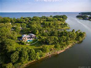 Incredible Mead Point Association waterfront custom 6 bedroom home with unmatched scenic tranquility.