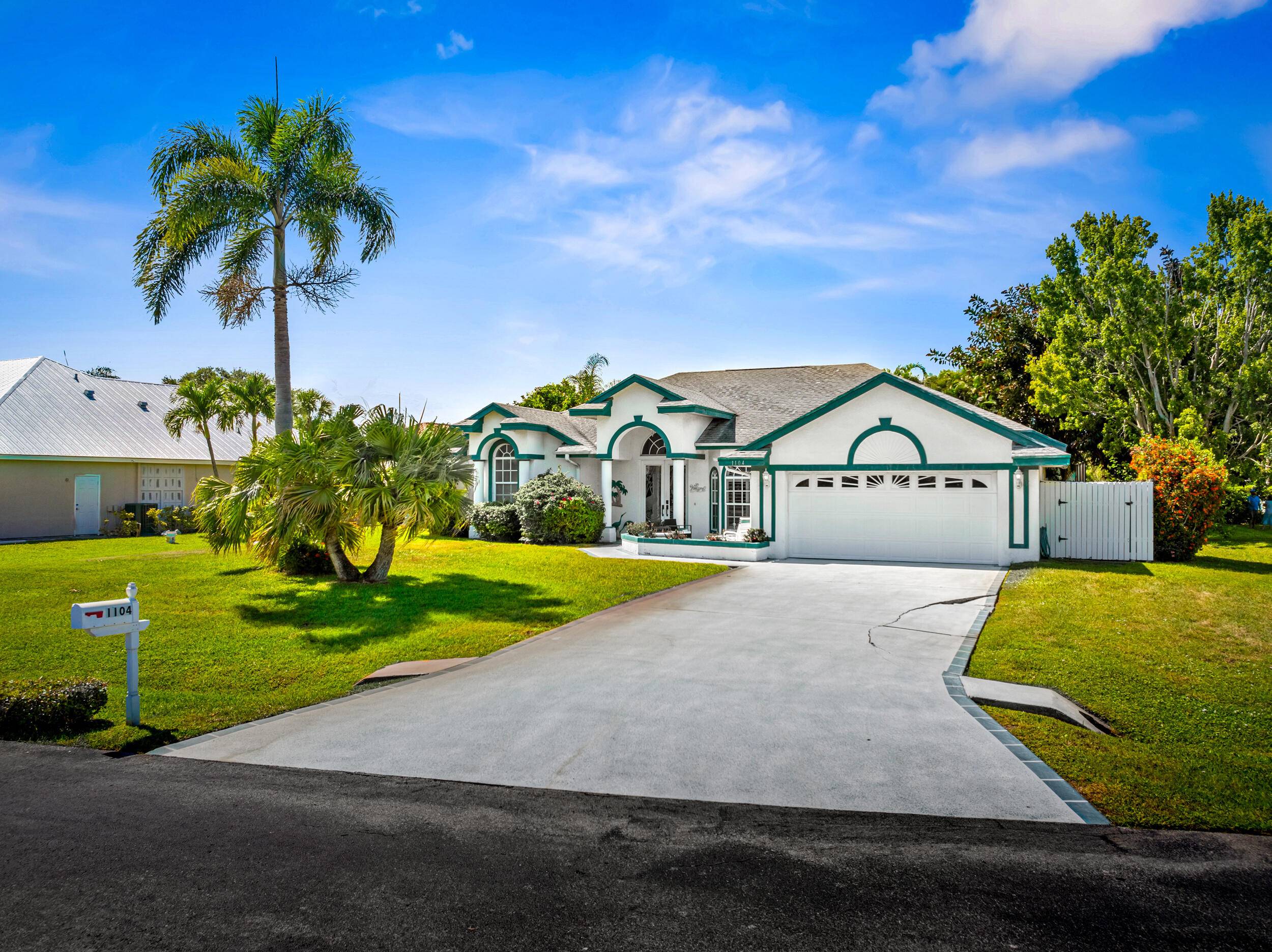 Welcome to 1104 SE Strathmore Drive, nestled in the quiet and charming River Vista community of Port Saint Lucie.