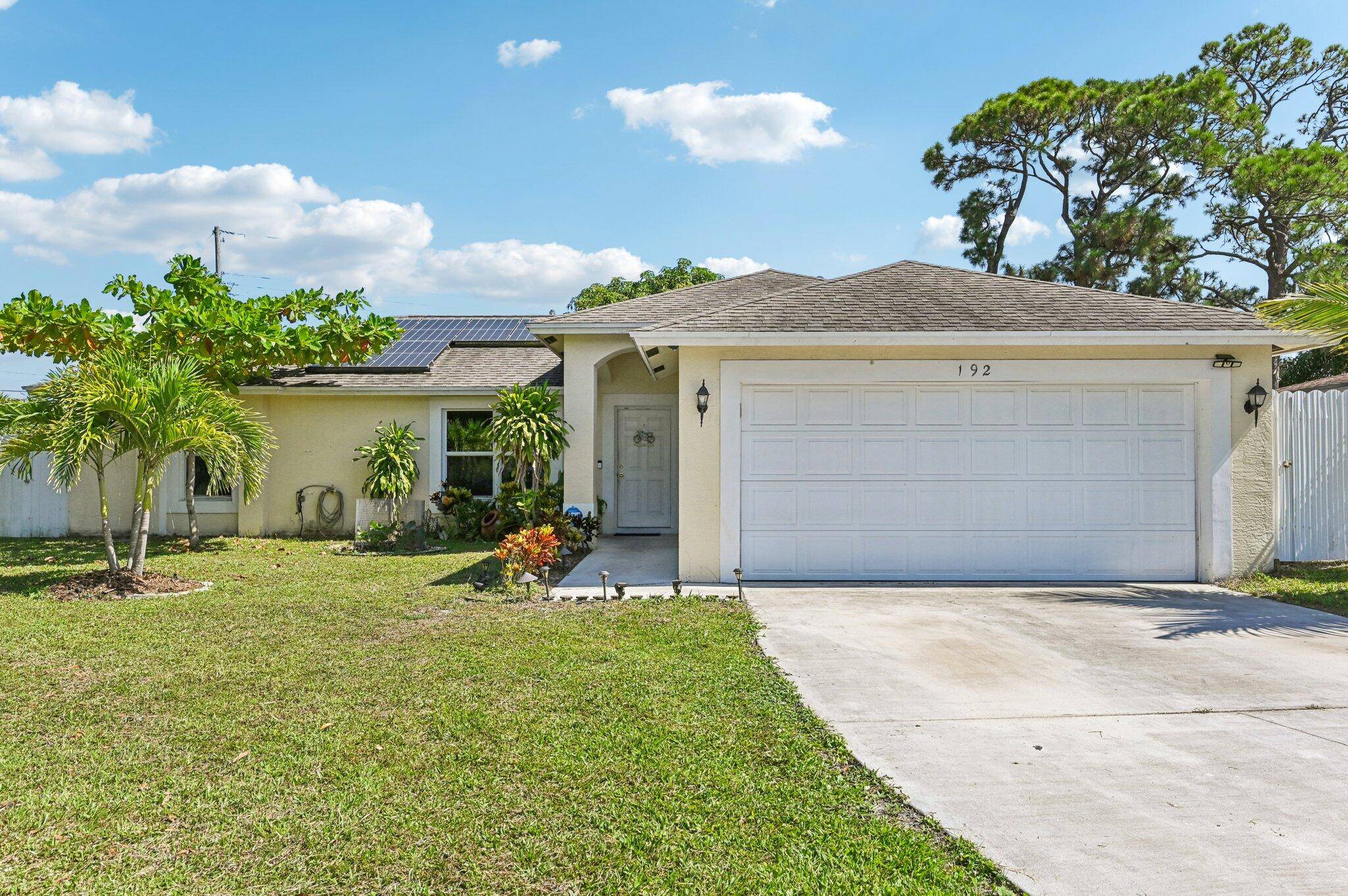 Located in the heart of Port Saint Lucie, This spacious 3 bedroom, 2 bath home has an open kitchen design, high ceilings, lots of natural light and is move in ...
