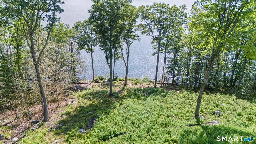 Set along the serene shores of Woodridge Lake, Lot 5 on Milton Road presents a rare opportunity to own a substantial piece of true waterfront in one of Litchfield County's ...