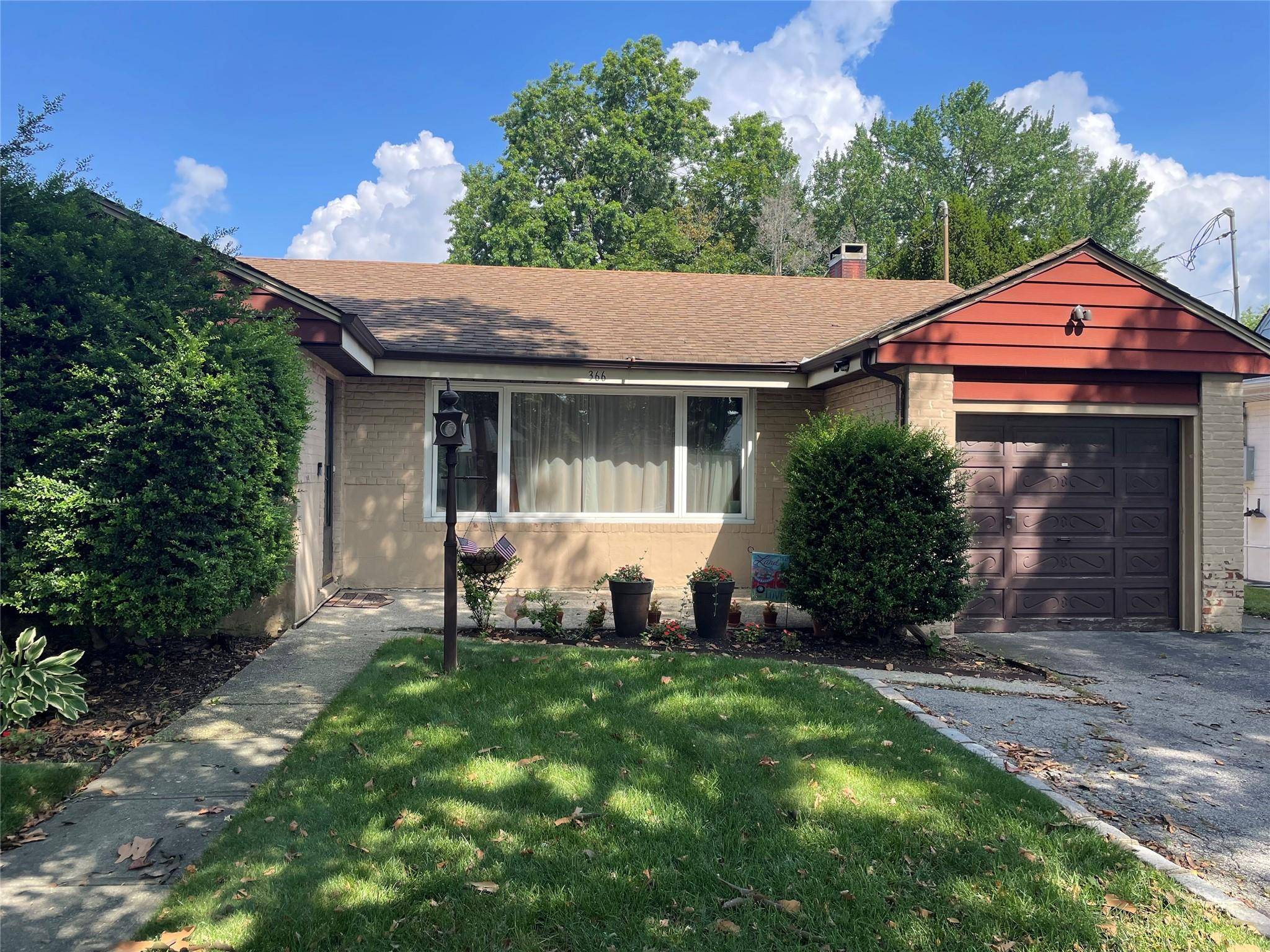 Discover the potential of this charming home nestled in the heart of Lynbrook.