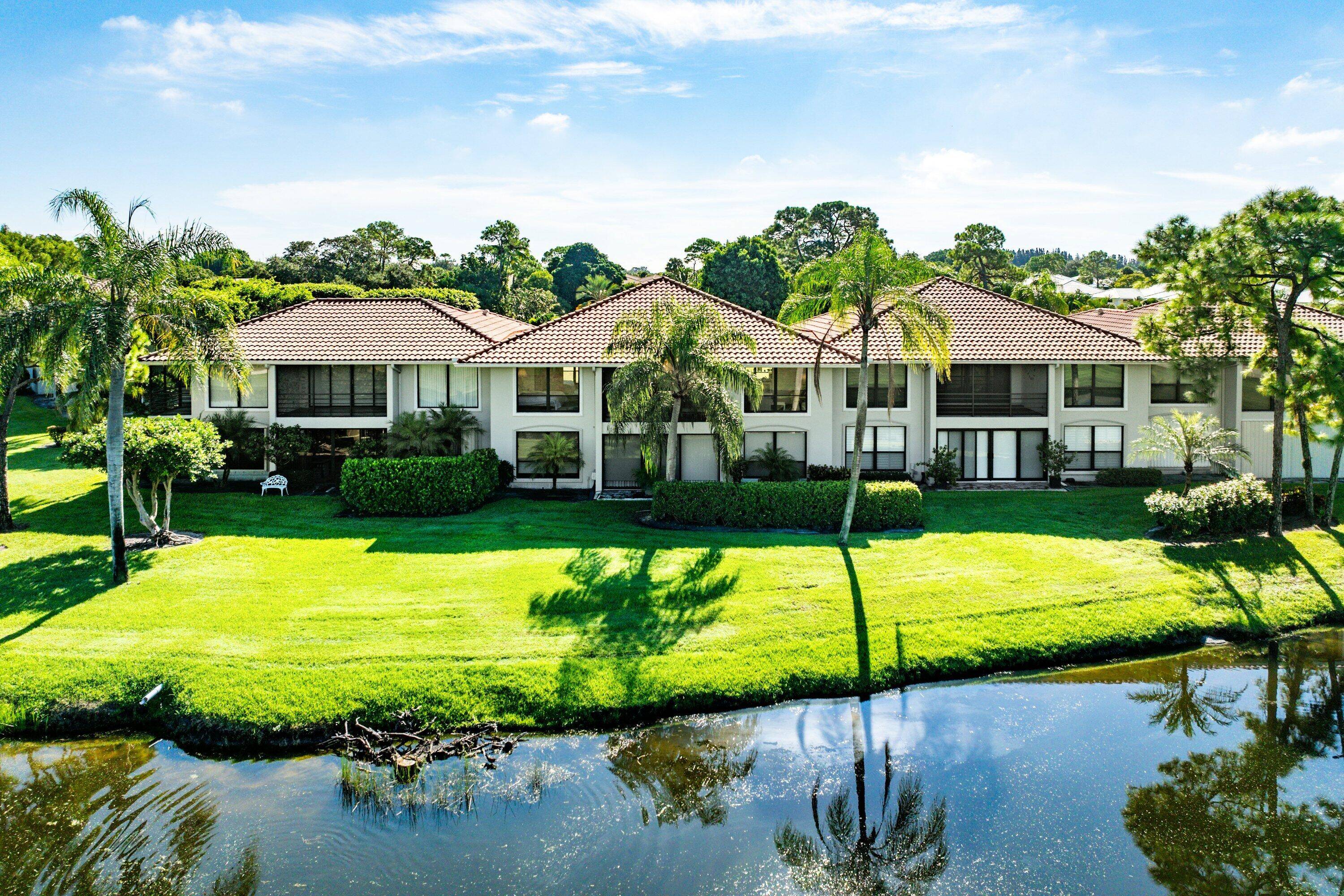 Located in the beautiful Mockingbird area of Quail Ridge,, this second floor 3 bedroom, 2 bath residence offers sweeping views of the serene lake and lush golf course.