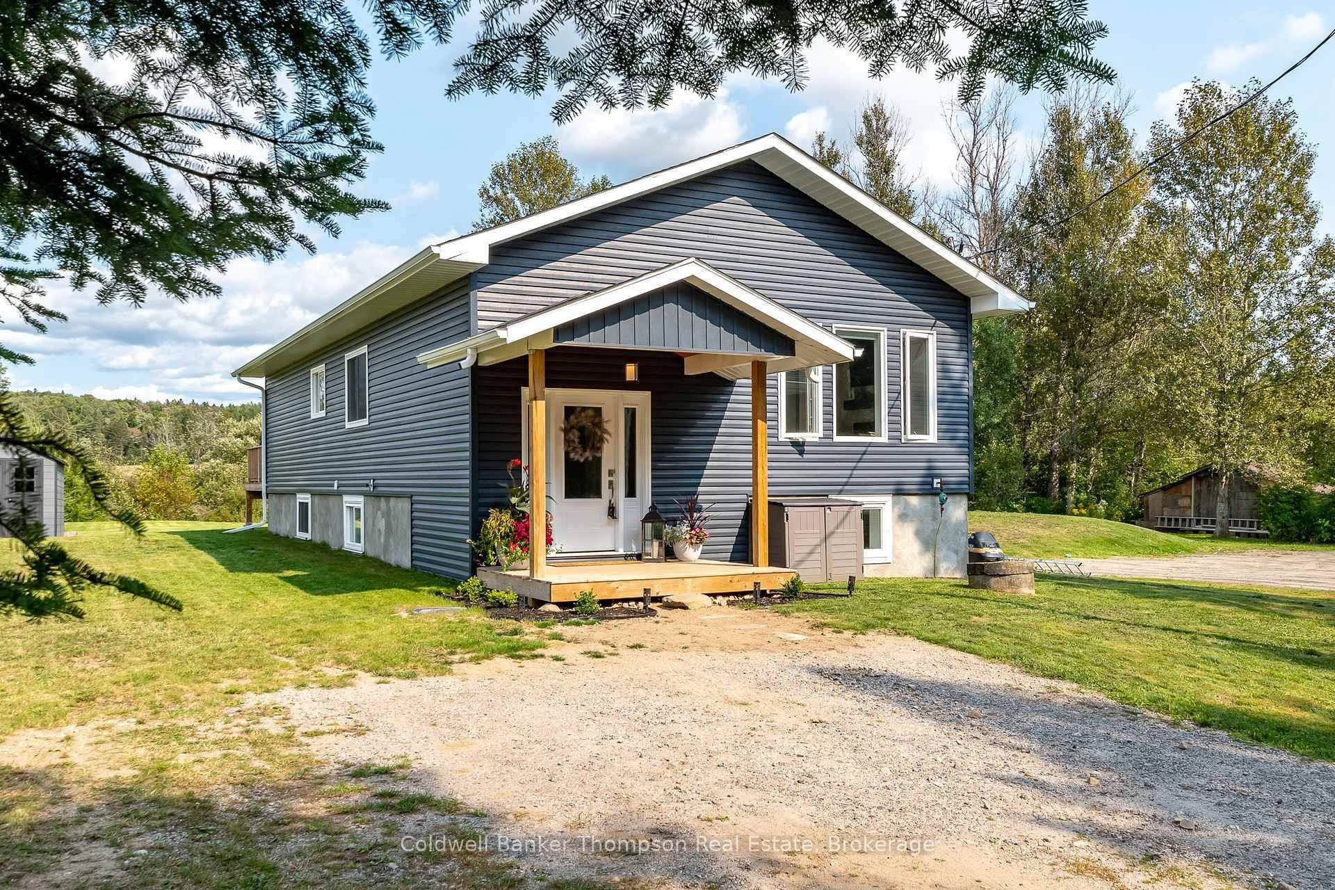 Welcome to this stunning newer built bungalow, where modern design meets the tranquillity of small town living in the peaceful Village of Emsdale.