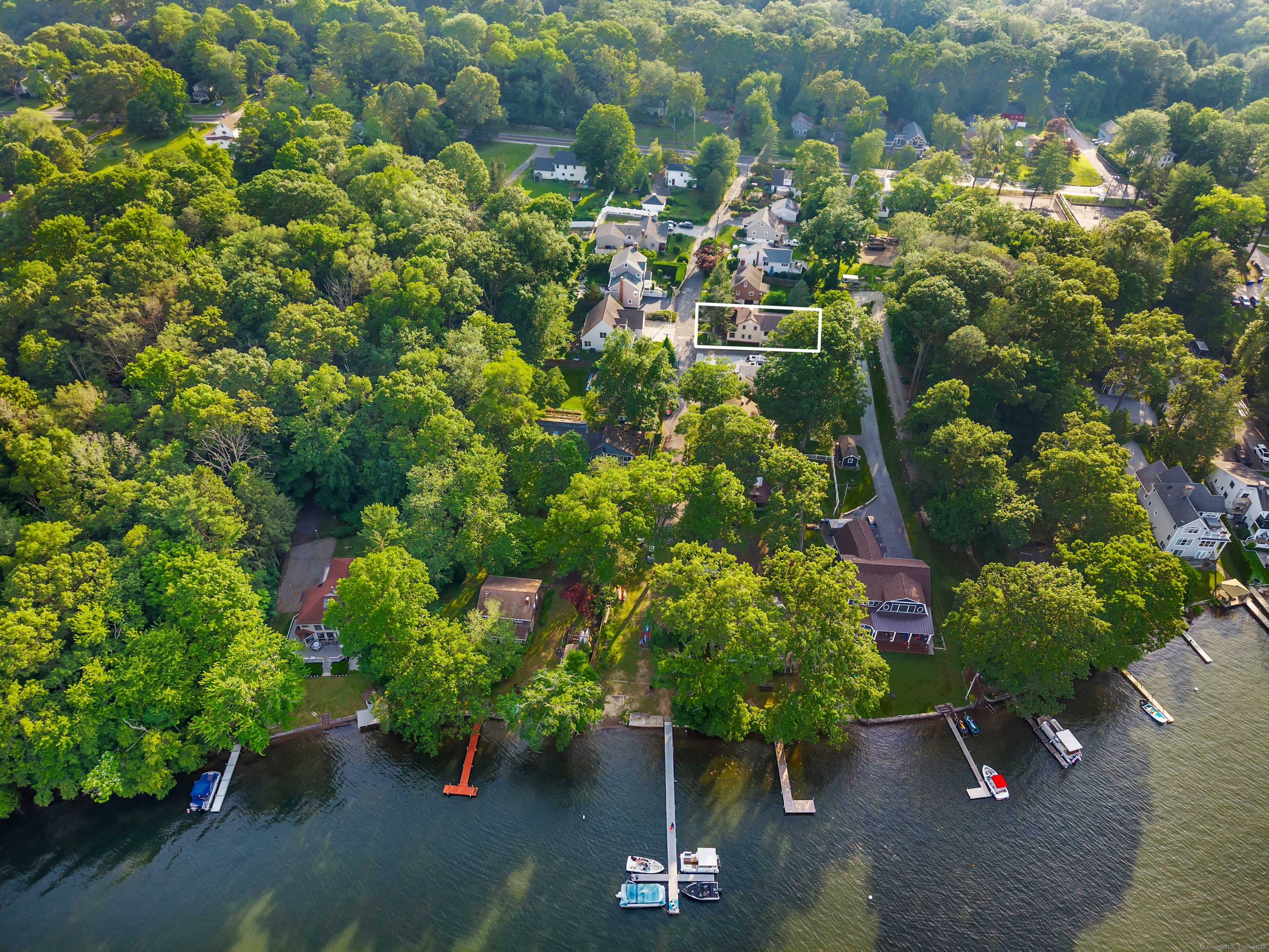 Welcome to this exquisite 4 bedroom, 2 bath lake home, ideally suited for year round living.