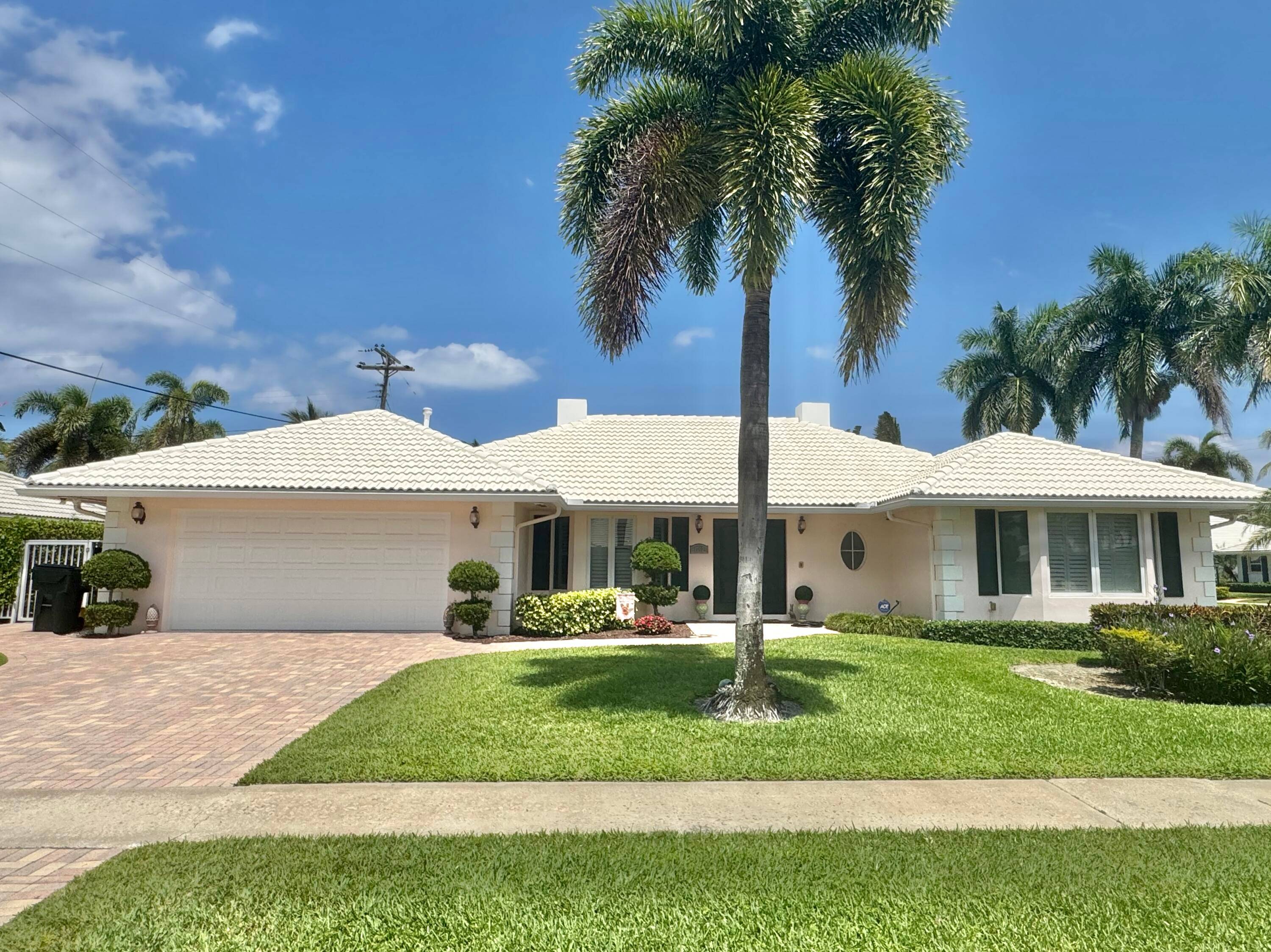 Welcome to this Camino Gardens estate pool home with impact windows, gorgeous hardwood floors, quality workmanship, solid wood doors, crown molding, beautiful wood cabinets, cook island, SUBZERO Refrigerator Thermador gas ...