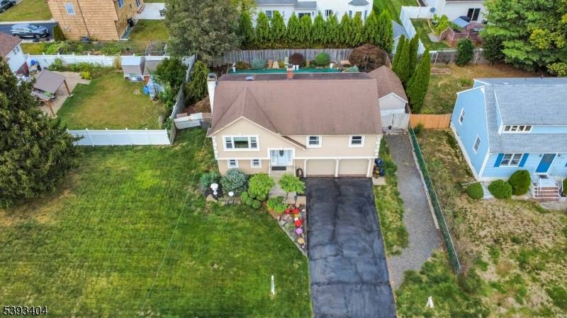 This charming home showcases true pride of ownership and sits on a spacious corner lot with outstanding curb appeal.