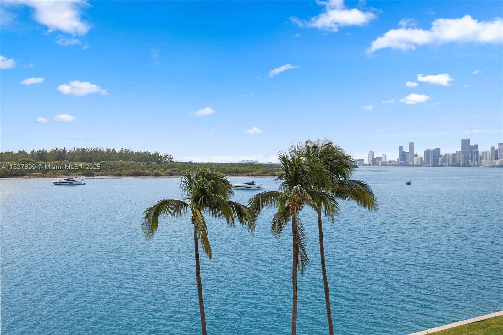 The largest of the only two townhomes ever built on Fisher Island's Bayside.