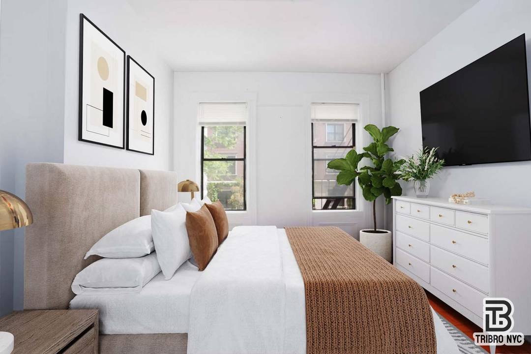 A bright and roomy railroad style 2 bedroom located just steps from Brooklyn Bridge Parks Pier 6 and the NYC Ferry.