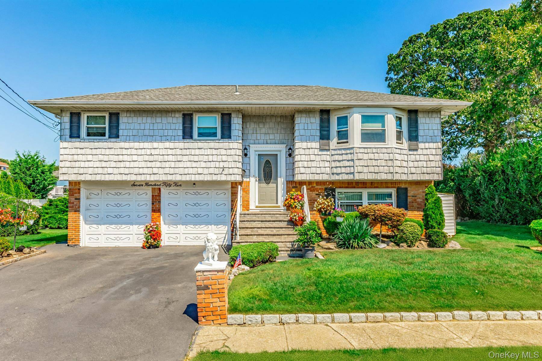 Welcome to the spacious 4 Bedroom, 2 Bath Hi Ranch in the Heart of Lindenhurst !
