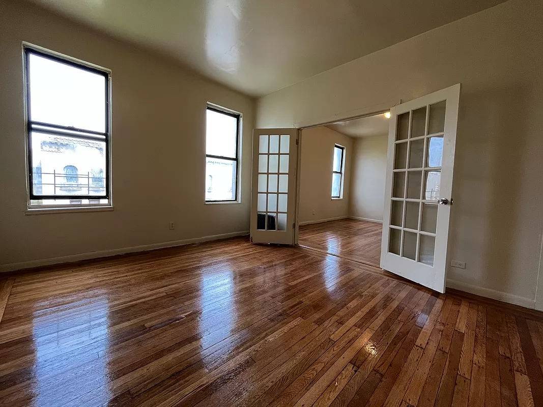 This is a recently renovated five bedroom apartment in the Washington Heights neighborhood !